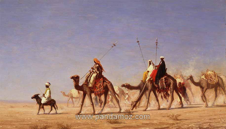 عکس تابلو نقاشی کاروان شترها در حال عبور از صحرا. در تصویر چند شتر دیده می شوند که مردانی بر آنها سوار هستند و نیزه هایی بلند بر دست دارند. در جلو کاروان مردی سوار خر و الاغ در حال حرکت است